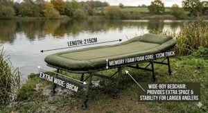 Wide-boy memory foam bedchair providing extra space and stability for larger anglers on long sessions.