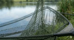 Graphic showing a 50-inch landing net size compared to standard smaller nets.