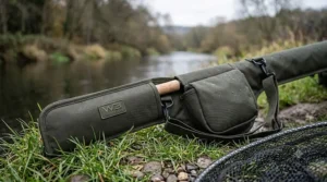 Protective rod sleeve for safely transporting a pike lure rod between different UK fisheries.