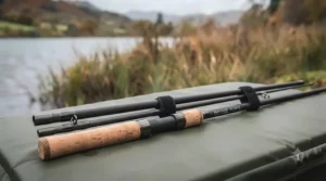 The two-piece pike deadbait rod collapsed and secured with Velcro ties, demonstrating its compact transport length suitable for mobile anglers.