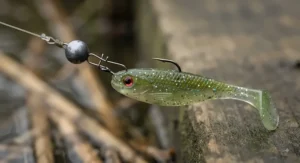 Close-up of a Cheburashka micro jig weight attached to a small lure for targeting perch.