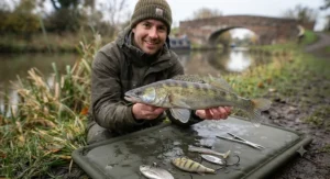 Close-up of chemically sharpened treble hooks on a budget-friendly zander hard lure.