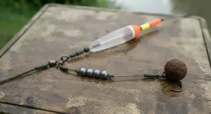 Heavy-duty waggler float rig rigged for presenting static baits near weed beds on a meandering English river.