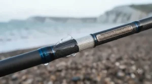 Close-up of high-modulus carbon fibre blank construction on a modern beachcaster rod.