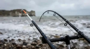 Close-up of hybrid and tubular beachcaster rod tips showing bite detection sensitivity in choppy sea conditions.