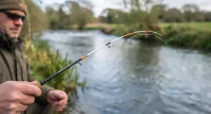 Ergonomic cork handle of a best-value barbel rod designed for comfortable river sessions.